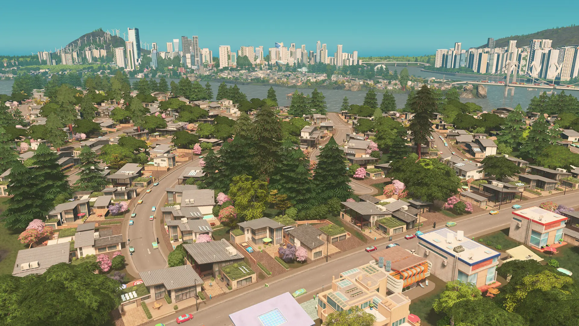 Een overzicht van een uitgestrekte stad met woonwijken en wolkenkrabbers in Cities: Skylines.